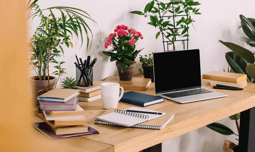 desk-with-plants plants bring outdoors in