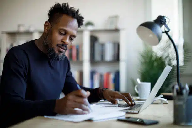 Man researching at home