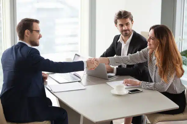 Business partners shaking hands